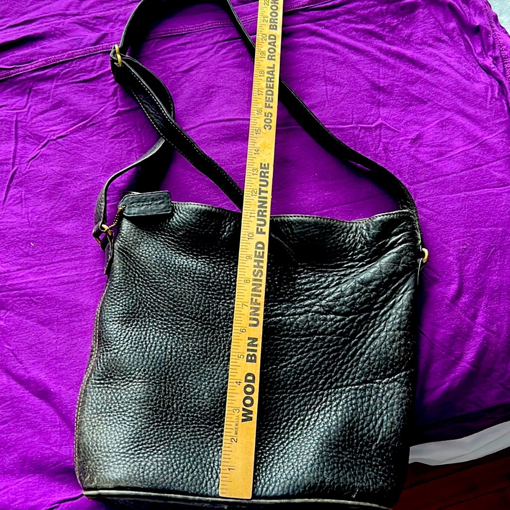 Coach zippered bucket pebbled cross body bag